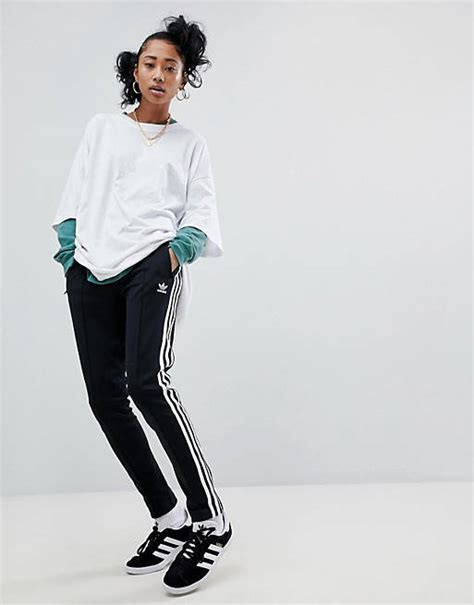 adidas Originals – adicolor – Schwarze Zigarettenhose mit drei 